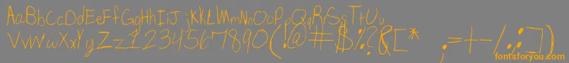 フォントSpDearMom – オレンジの文字は灰色の背景にあります。
