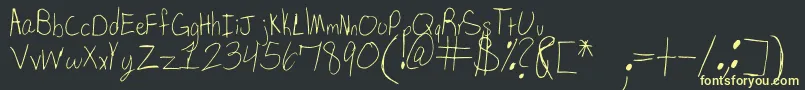 SpDearMom Font – Yellow Fonts on Black Background
