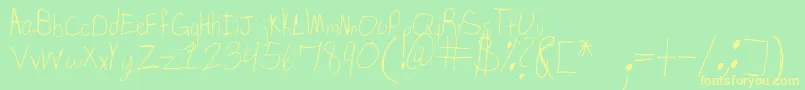 SpDearMom Font – Yellow Fonts on Green Background