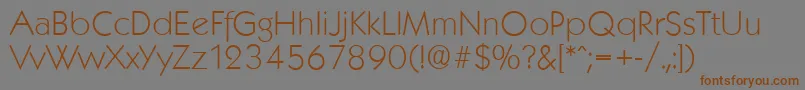 フォントKoblenzserialXlightRegular – 茶色の文字が灰色の背景にあります。