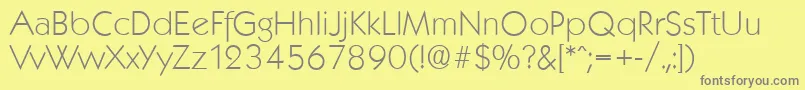 KoblenzserialXlightRegular-fontti – harmaat kirjasimet keltaisella taustalla