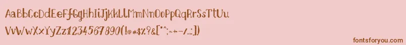Шрифт Nikolaidishand – коричневые шрифты на розовом фоне
