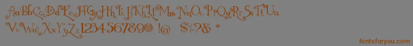 フォントNemo – 茶色の文字が灰色の背景にあります。