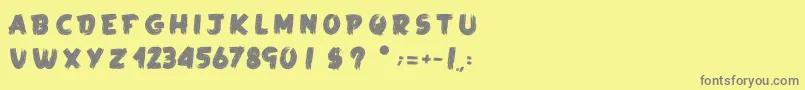 フォントLaKameALeon – 黄色の背景に灰色の文字