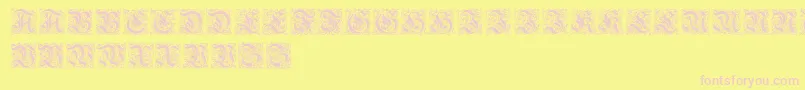 KanzleiInitialen Font – Pink Fonts on Yellow Background