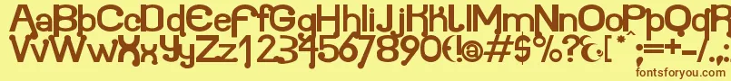 フォントAtomium – 茶色の文字が黄色の背景にあります。