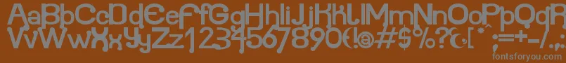 Atomium-fontti – harmaat kirjasimet ruskealla taustalla