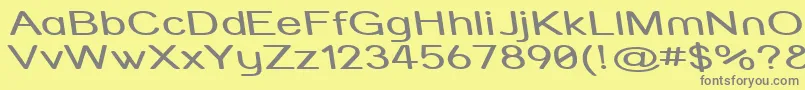 フォントStrvarrx – 黄色の背景に灰色の文字
