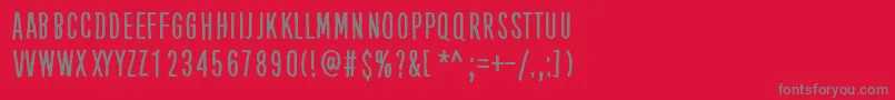 フォントKubeVertiko – 赤い背景に灰色の文字
