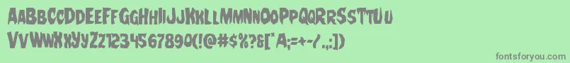 フォントNightchildecond – 緑の背景に灰色の文字