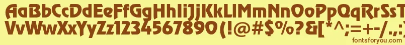 フォントRevuestd – 茶色の文字が黄色の背景にあります。