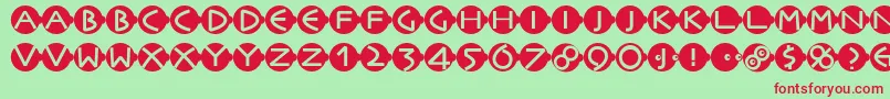 Facesandcaps-Schriftart – Rote Schriften auf grünem Hintergrund