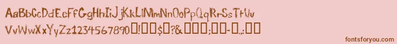 TraumaRegular-Schriftart – Braune Schriften auf rosa Hintergrund