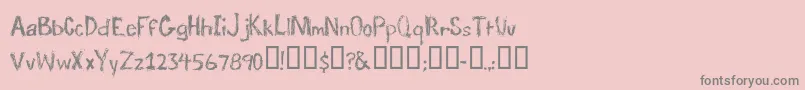 TraumaRegular-Schriftart – Graue Schriften auf rosa Hintergrund