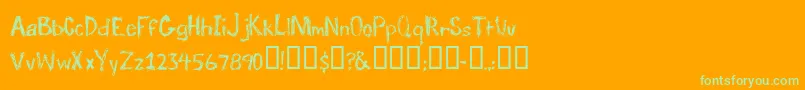 TraumaRegular-fontti – vihreät fontit oranssilla taustalla