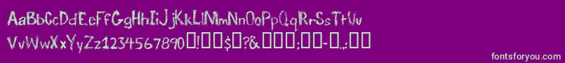 TraumaRegular Font – Green Fonts on Purple Background