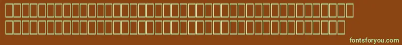 フォントHqpb4 – 緑色の文字が茶色の背景にあります。