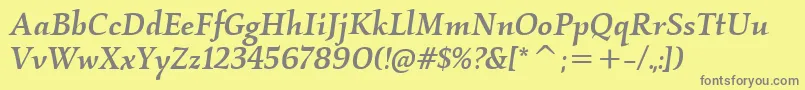 フォントKallosItcMediumItalic – 黄色の背景に灰色の文字