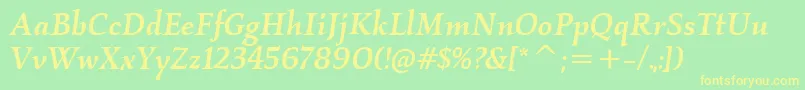 KallosItcMediumItalic-fontti – keltaiset fontit vihreällä taustalla