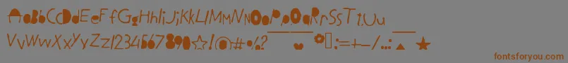 フォントBlackLetters – 茶色の文字が灰色の背景にあります。