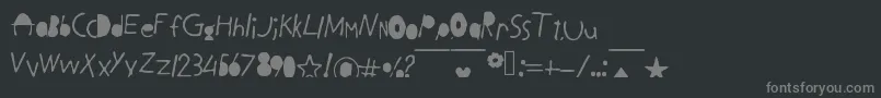Fonte BlackLetters – fontes cinzas em um fundo preto