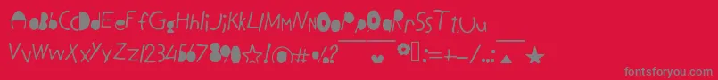フォントBlackLetters – 赤い背景に灰色の文字