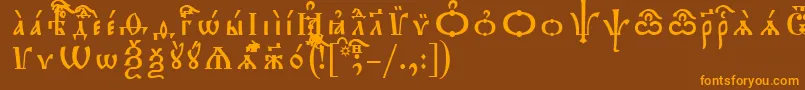 フォントTriodionUcsSpacedout – オレンジ色の文字が茶色の背景にあります。