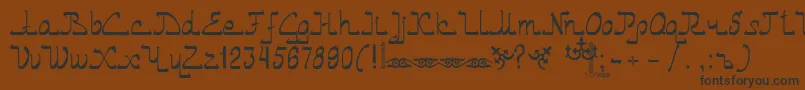 Asylbekm01.Kz Font – Black Fonts on Brown Background