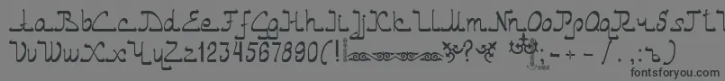 Asylbekm01.Kz Font – Black Fonts on Gray Background