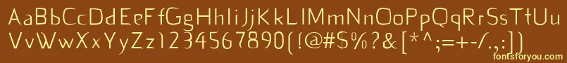 Dekiru-fontti – keltaiset fontit ruskealla taustalla