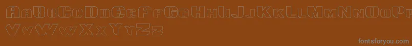 Fonte Grotesca3D – fontes cinzas em um fundo marrom