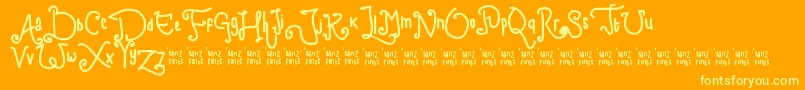 フォントChildWriting – オレンジの背景に黄色の文字