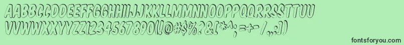 Komtits Font – Black Fonts on Green Background