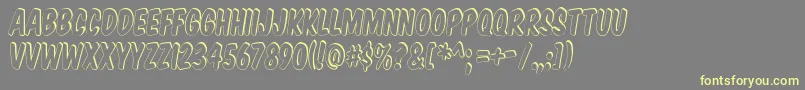 Komtits Font – Yellow Fonts on Gray Background