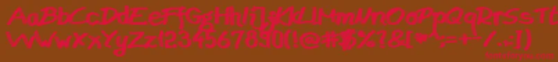 フォントBudapestMarketsHd – 赤い文字が茶色の背景にあります。