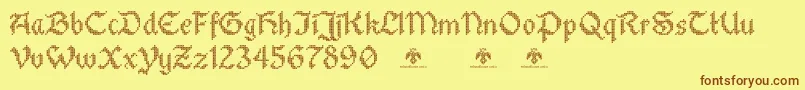 フォントStitchwarriorDemo – 茶色の文字が黄色の背景にあります。