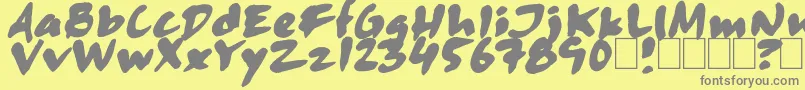 Skitsercartoon-fontti – harmaat kirjasimet keltaisella taustalla