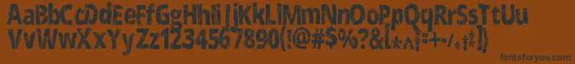 Fonte CrackedNarrow – fontes pretas em um fundo marrom