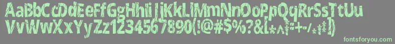 フォントCrackedNarrow – 灰色の背景に緑のフォント