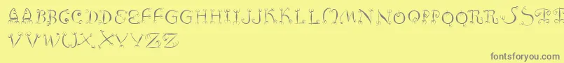 Fishhooks-Schriftart – Graue Schriften auf gelbem Hintergrund