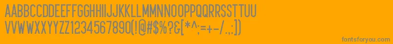 フォントKudajets – オレンジの背景に灰色の文字