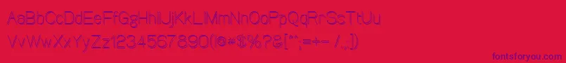 Canin Font – Purple Fonts on Red Background