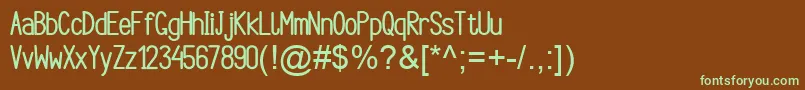 フォントArgocksazBoldViper78 – 緑色の文字が茶色の背景にあります。