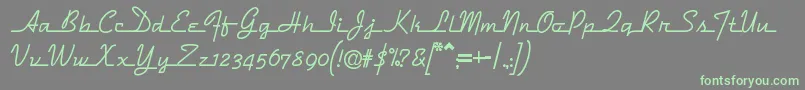 Dymaxion Font – Green Fonts on Gray Background