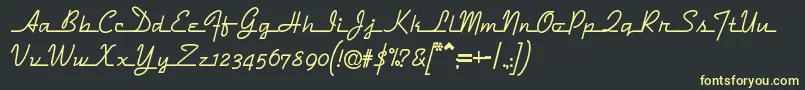 Dymaxion Font – Yellow Fonts on Black Background