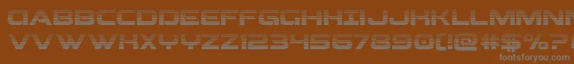 Beamweapongrad-fontti – harmaat kirjasimet ruskealla taustalla