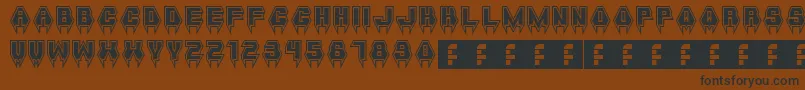 フォントMetalVampire – 黒い文字が茶色の背景にあります