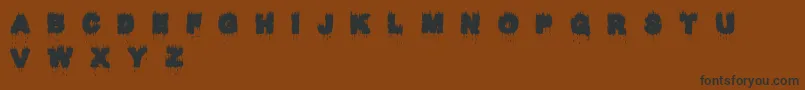 Raptor Kill Font – Black Fonts on Brown Background