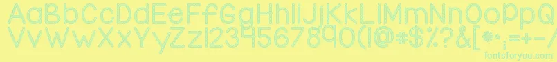 Kgcandycanestripe-Schriftart – Grüne Schriften auf gelbem Hintergrund