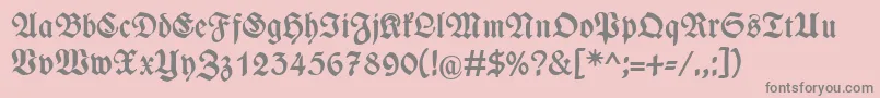 フォントWieynckfrakturFettunz1l – ピンクの背景に灰色の文字